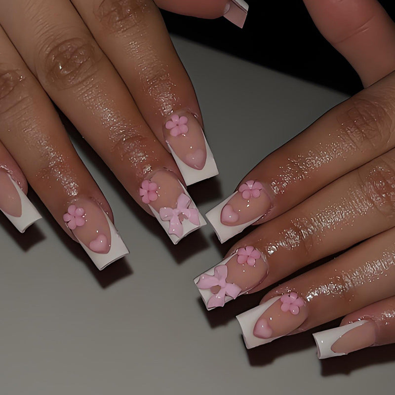 Artificial nail set with romantic flowers and elegant accents Stornfield