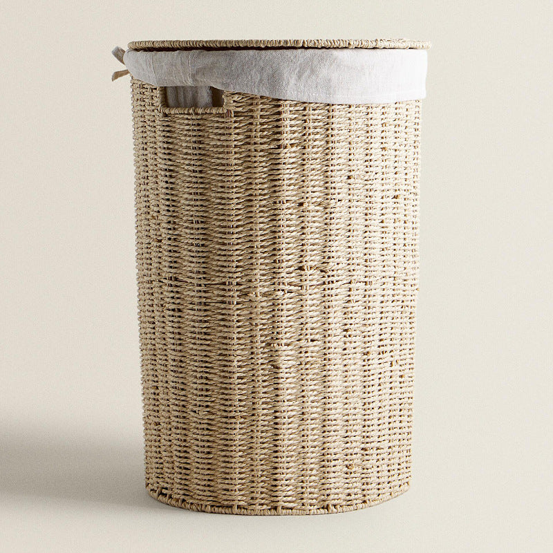 Round laundry basket made of natural materials Stornfield