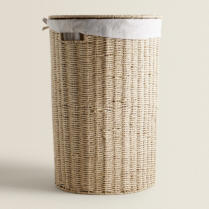 Round laundry basket made of natural materials Stornfield