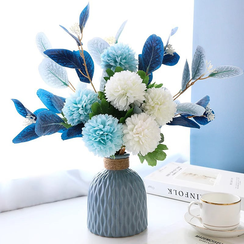 Decorative Floral Arrangement with Stylish Vase
