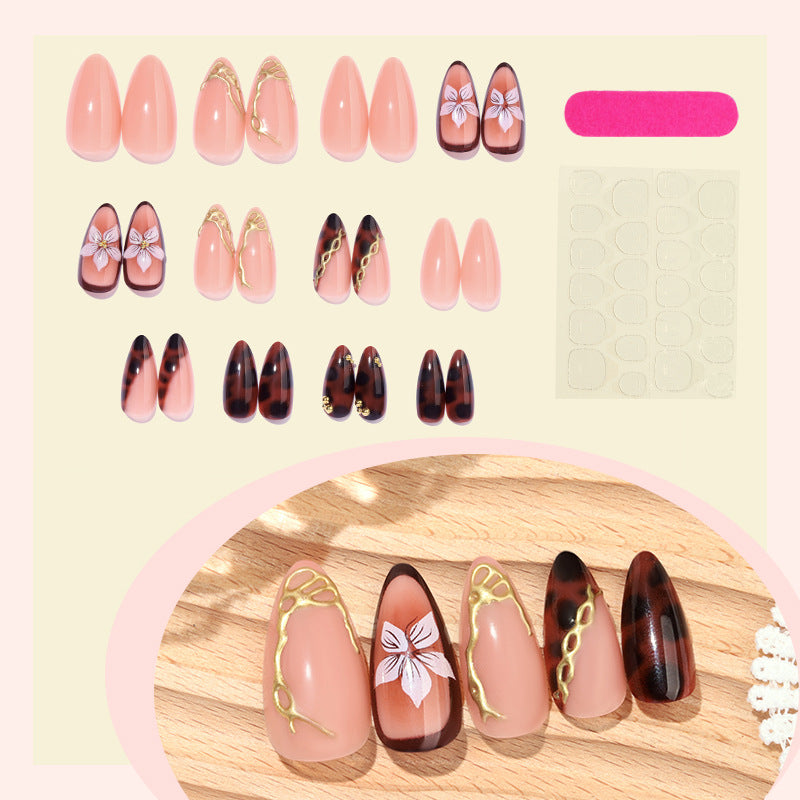 Artistic Press-On Nail Set with Elegant Floral and Abstract Designs Stornfield