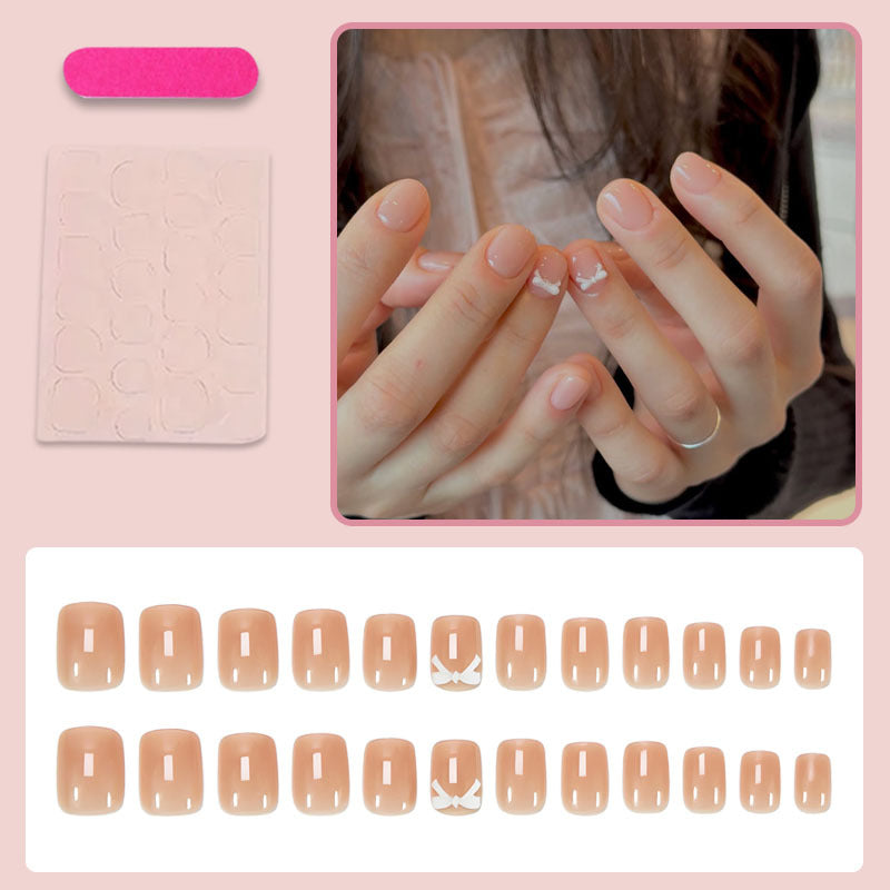 Artificial nail set with romantic bow designs Stornfield