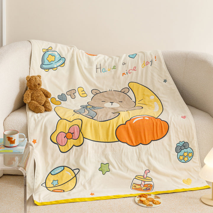 Kids' cuddly blanket with cheerful vehicle print made of soft microfibre