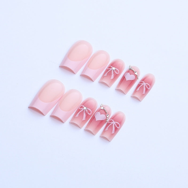 Nail art set with elegant bow and glitter motifs Stornfield
