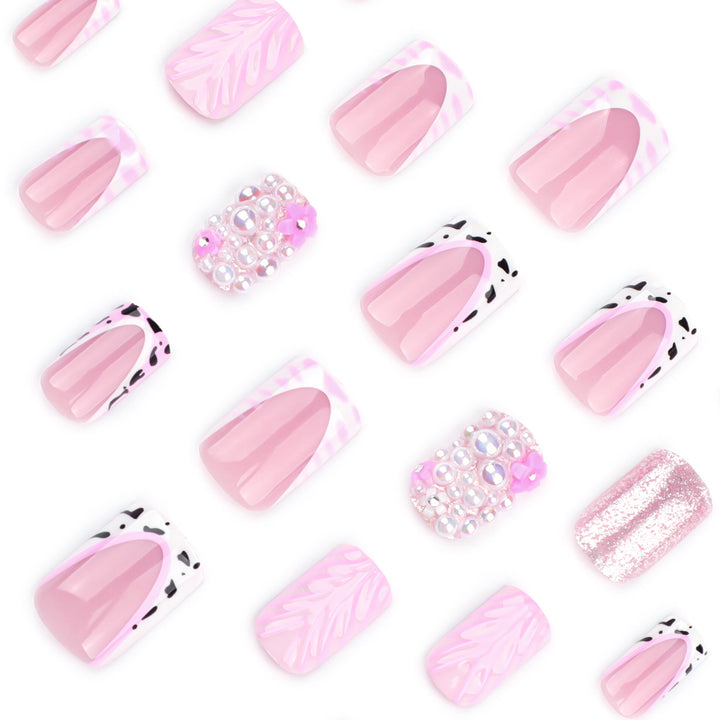 Artful nail extensions with mother-of-pearl effects and delicate design Stornfield