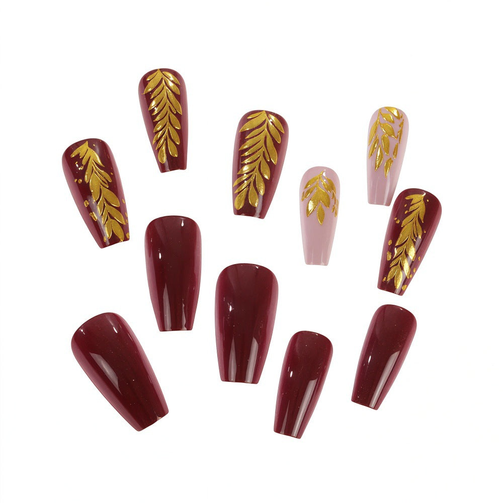Elegant artificial nails with gold decoration Stornfield