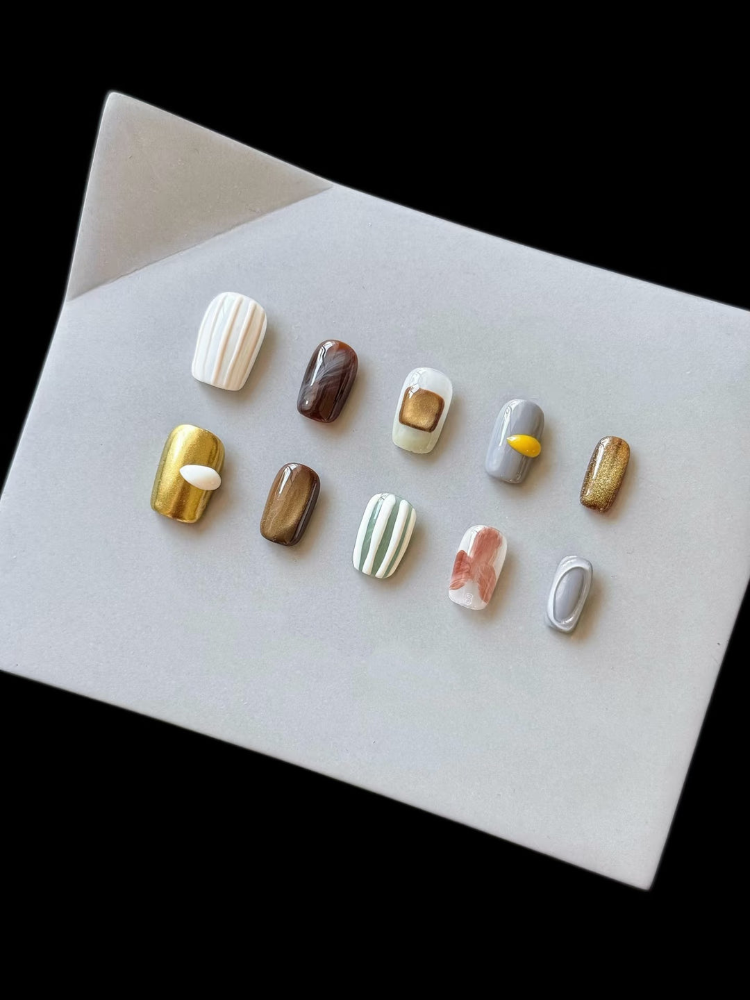 Artistic Press-On Nail Set with Unique Textured Designs