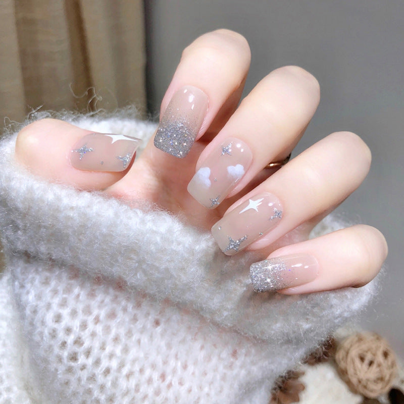 Glittering nail extensions with creative jewelry design Stornfield