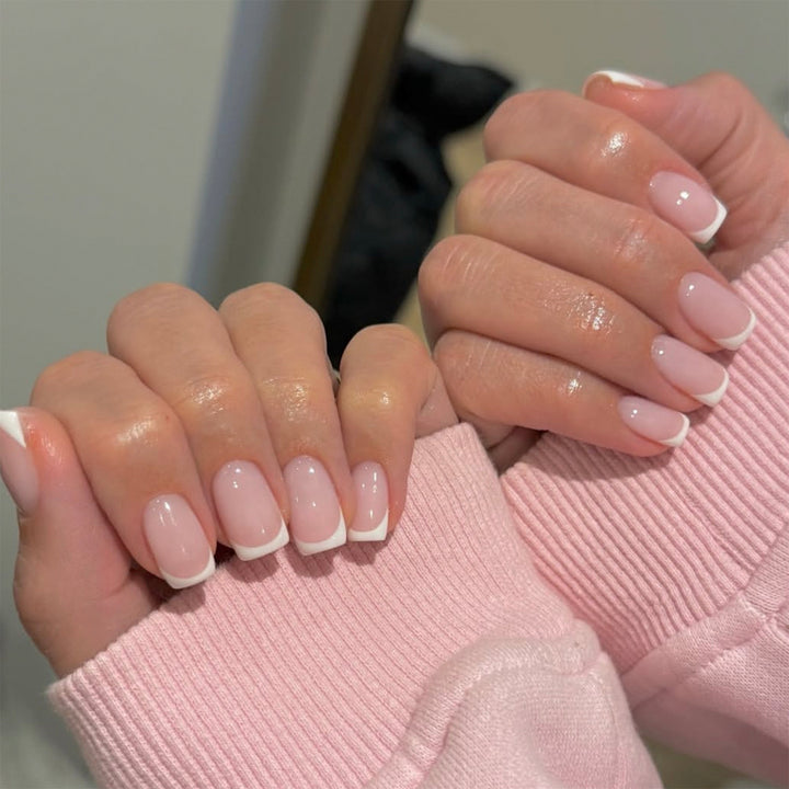 Elegant high-gloss nail art with French design Stornfield
