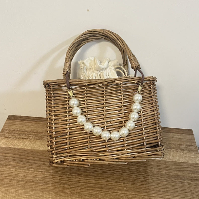 Ladies' basket bag with decorative pearl accents and bow decoration Stornfield