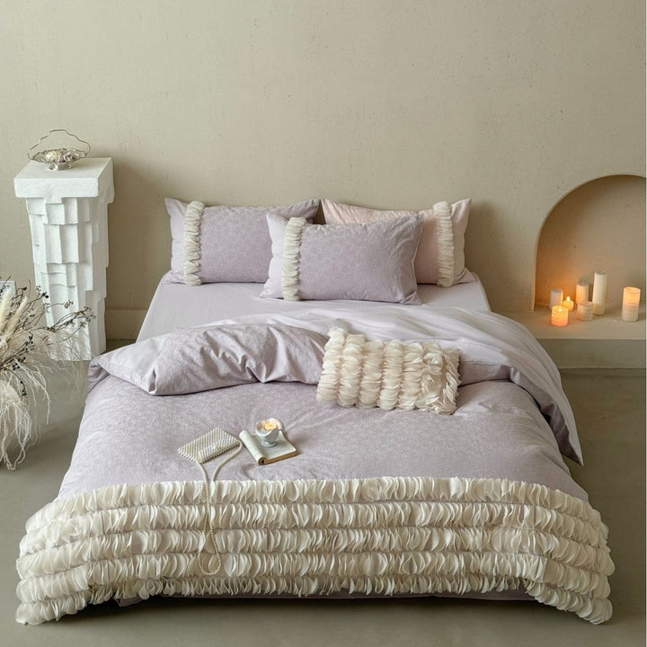 Romantic ruffle bedding set with layered frill and quilted bedspread