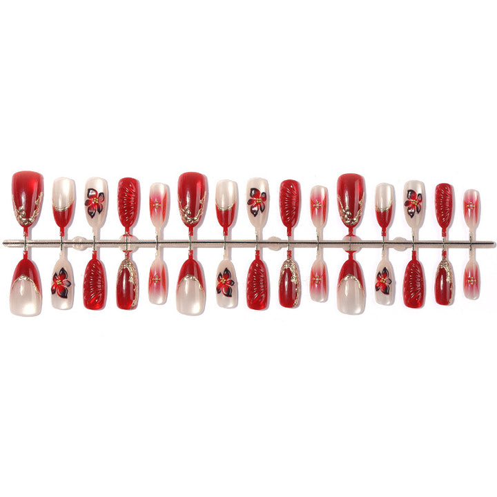 Decorative Press-On Nail Art Set with Floral and Glossy Accents Stornfield