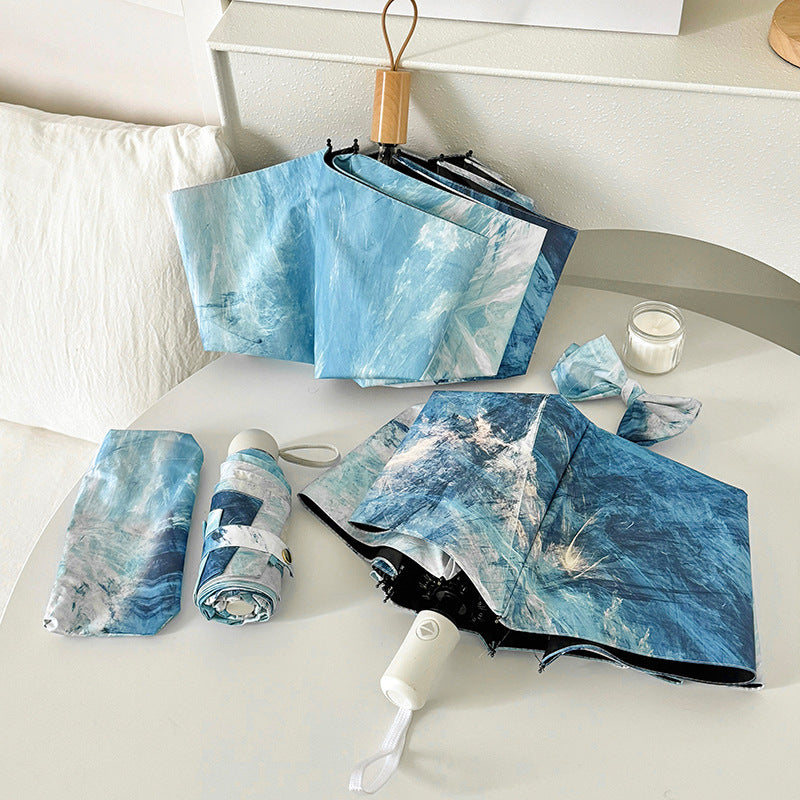 Ladies elegant folding umbrella with unique marble pattern Stornfield