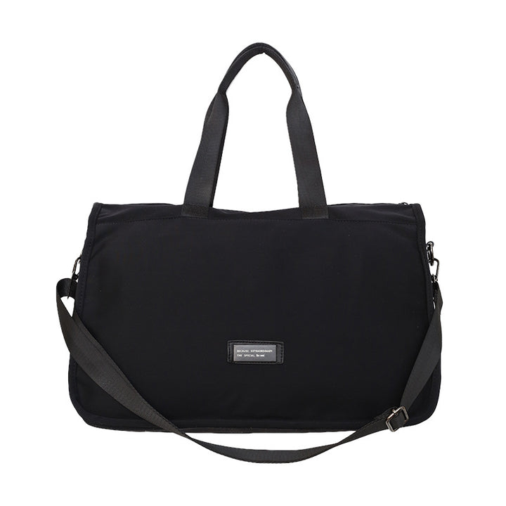 Sporty travel bag with ergonomic carrying handles and versatile compartments Stornfield