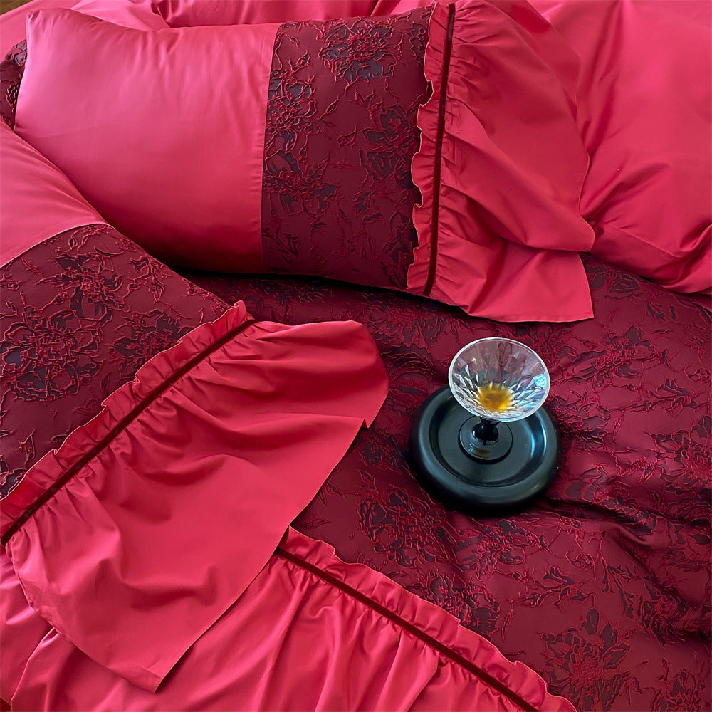 Luxurious satin bedding set with ruffles and lace appliqué
