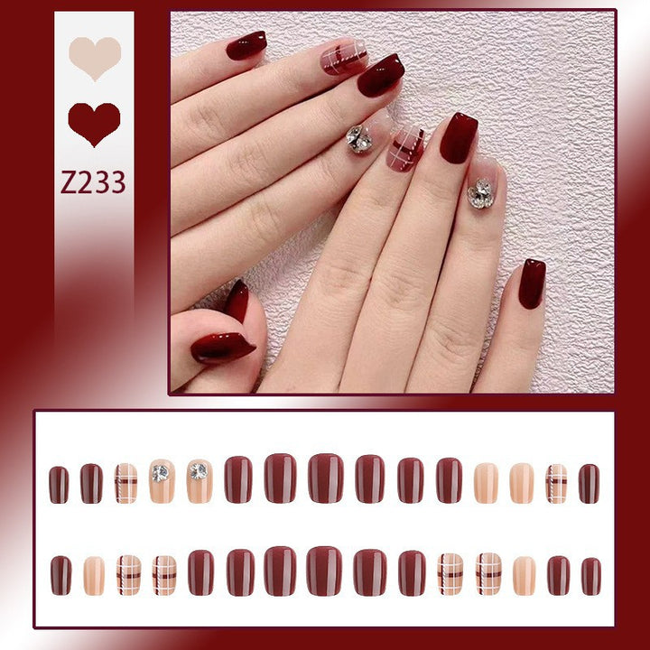 Artificial nail set with elegant, shimmering design and creative accents Stornfield