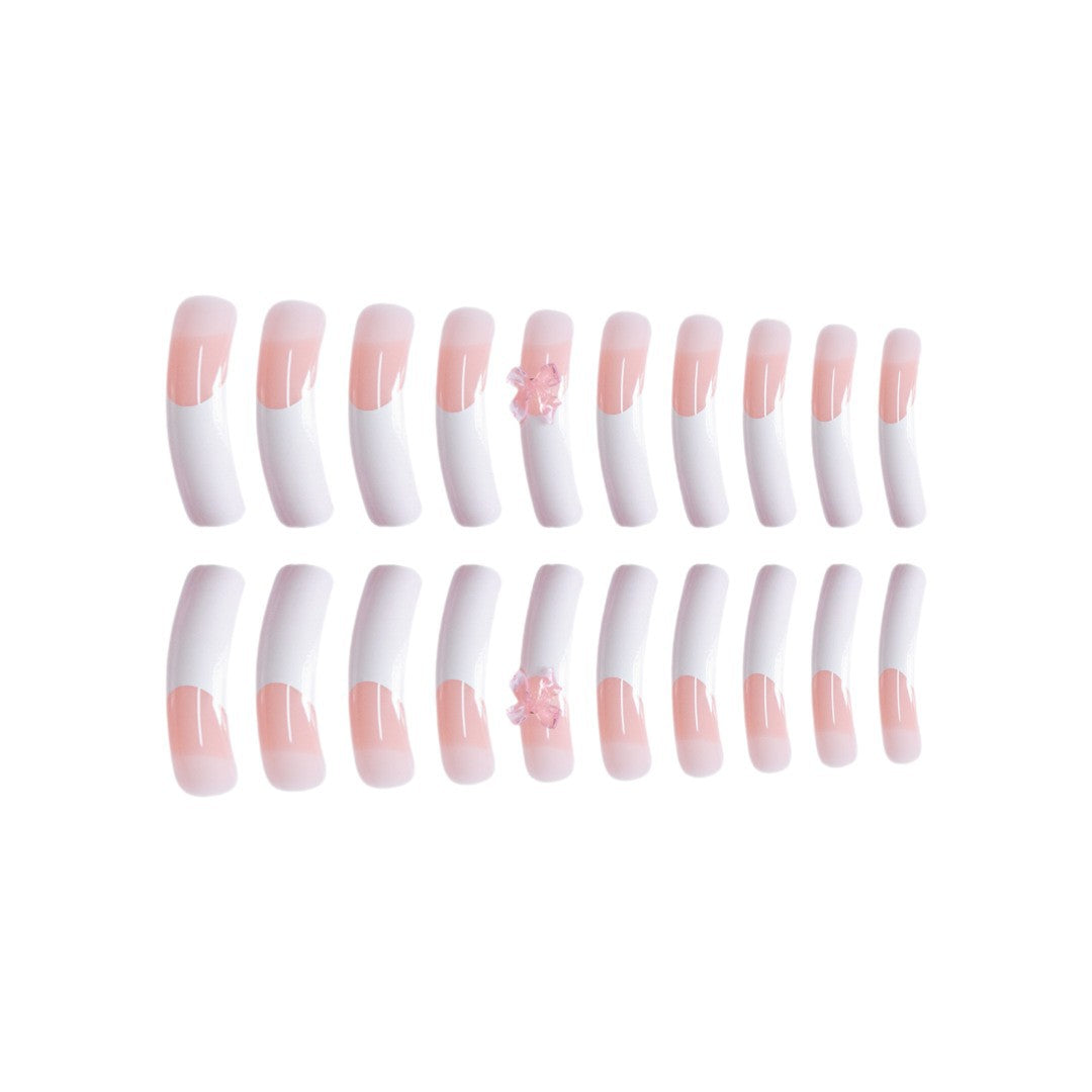 Elegant French Tip Press-On Nails with Bow Accents Stornfield