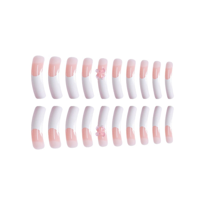 Elegant French Tip Press-On Nails with Bow Accents Stornfield
