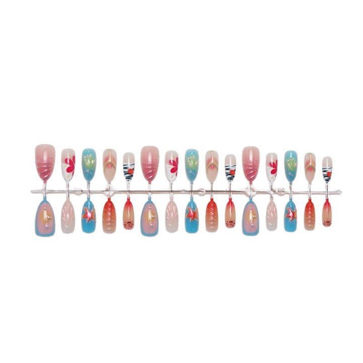 Artistic nail tips with maritime motifs Stornfield