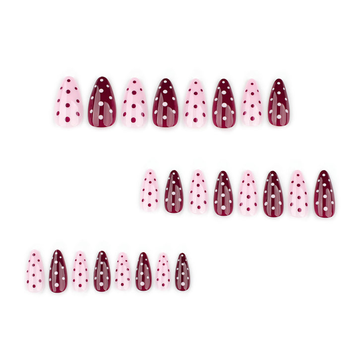 Artful Nail Extensions with Dots and Elegant Accents Stornfield