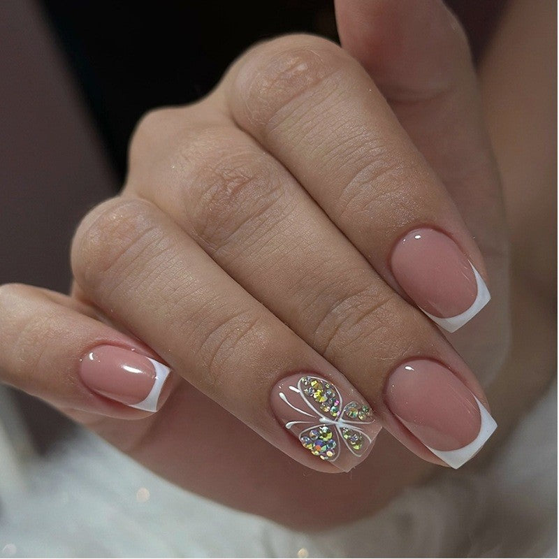 Artificial nail set with floral design and glamorous embellishments Stornfield