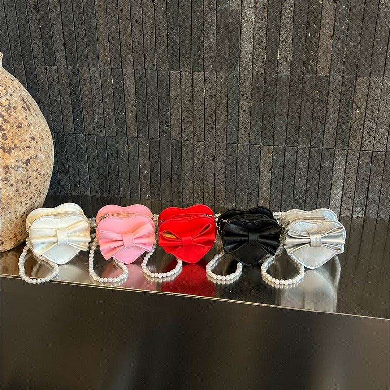 WoHeart-Shaped Bow Clutch Bag Stornfield