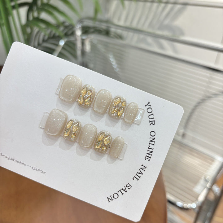 Artifical nail tips with glitter and rhinestones Stornfield