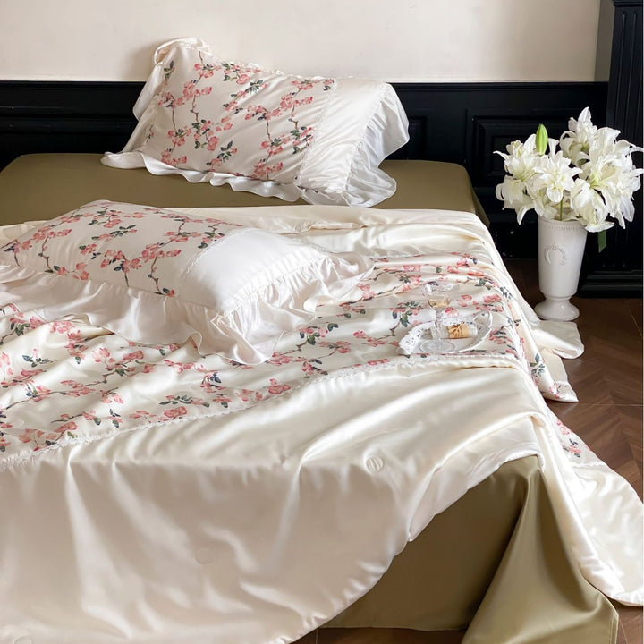Noble satin bedding set with floral all-over print and ruffled pillow