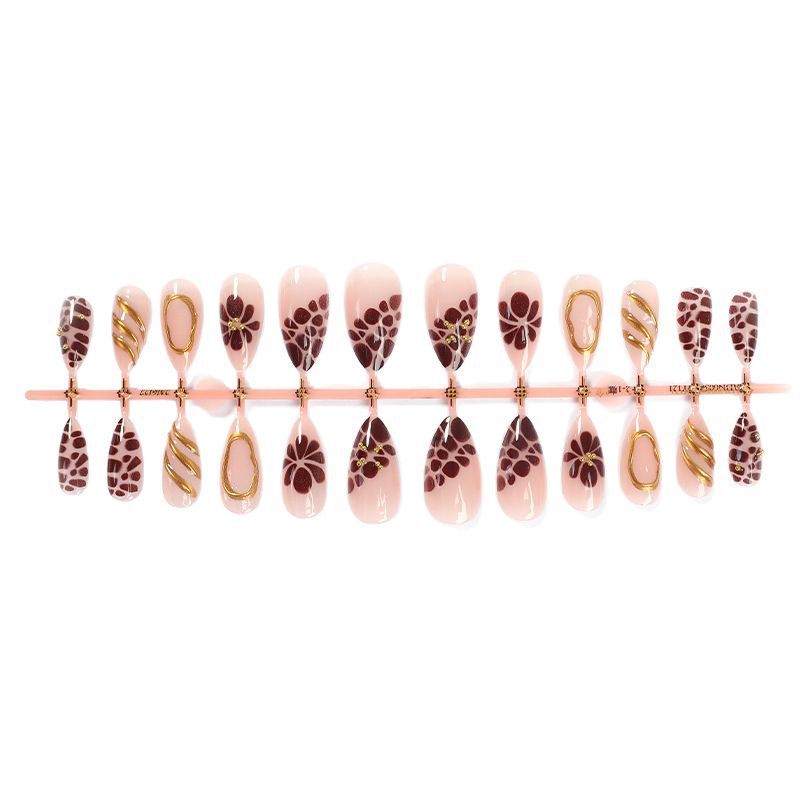 Artificial nail set with elegant flower and gold accents Stornfield