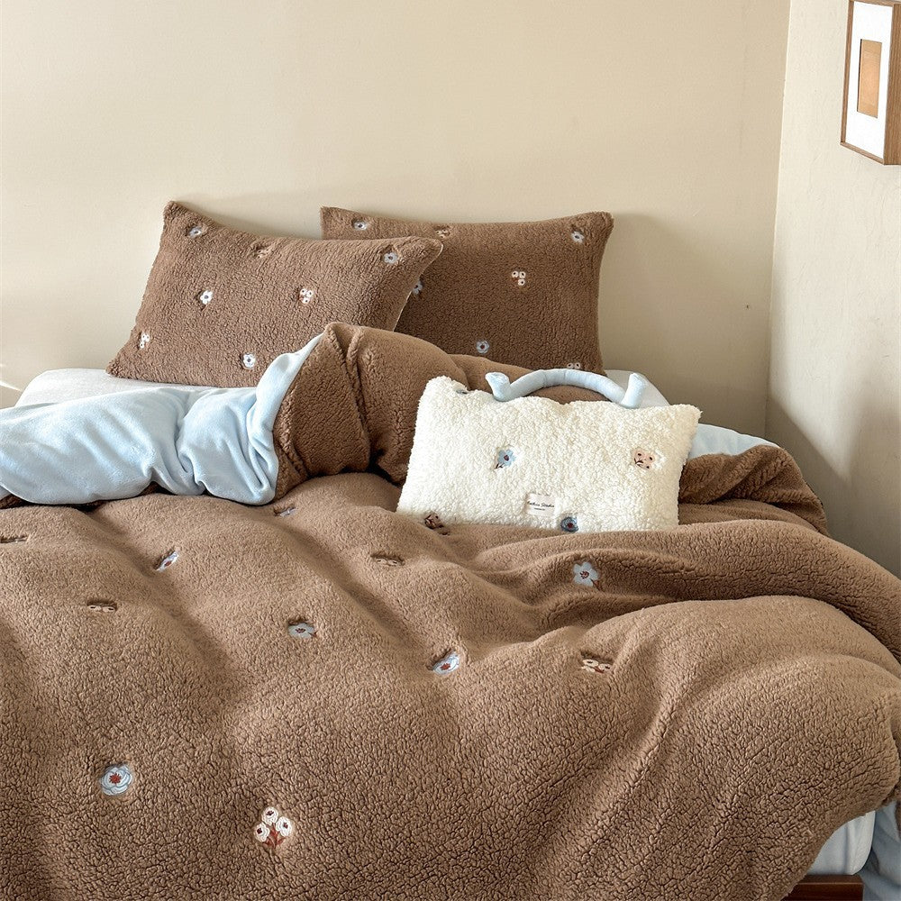 Sherpa bed blanket and reversible bed cover with embroidered flower appliqués