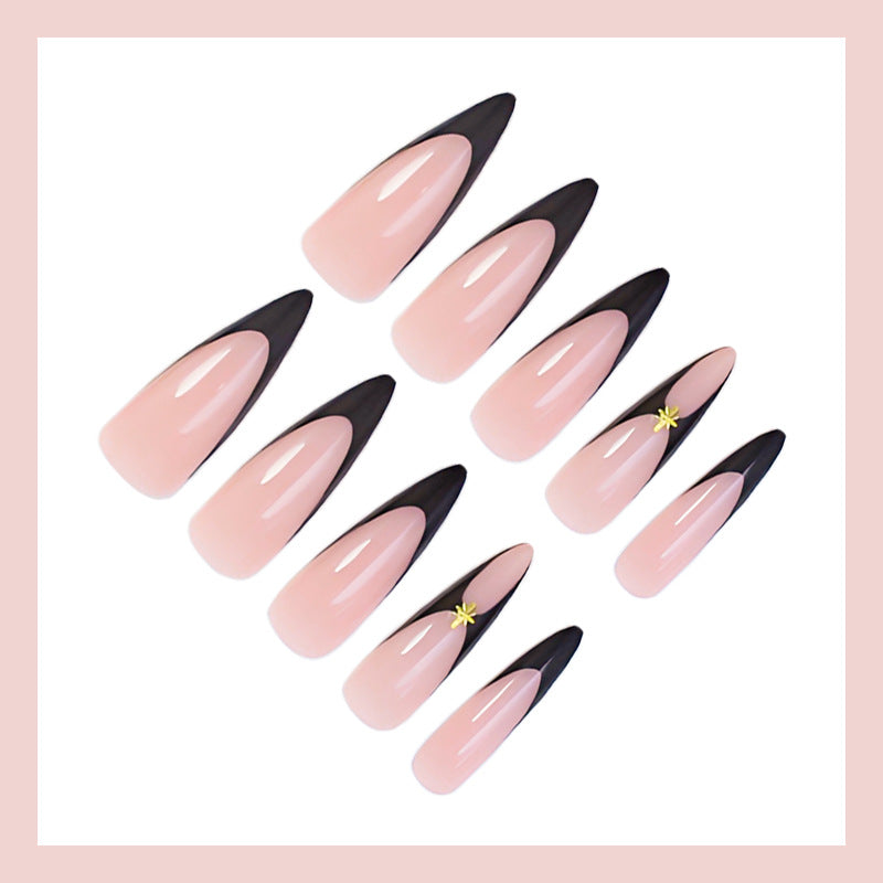 Artificial nail set with elegant lace design and glitter details Stornfield