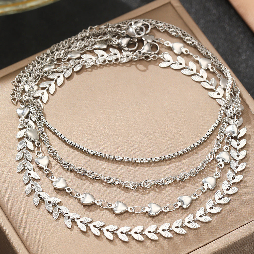 Elegant Layered Heart Charm Necklace Stornfield