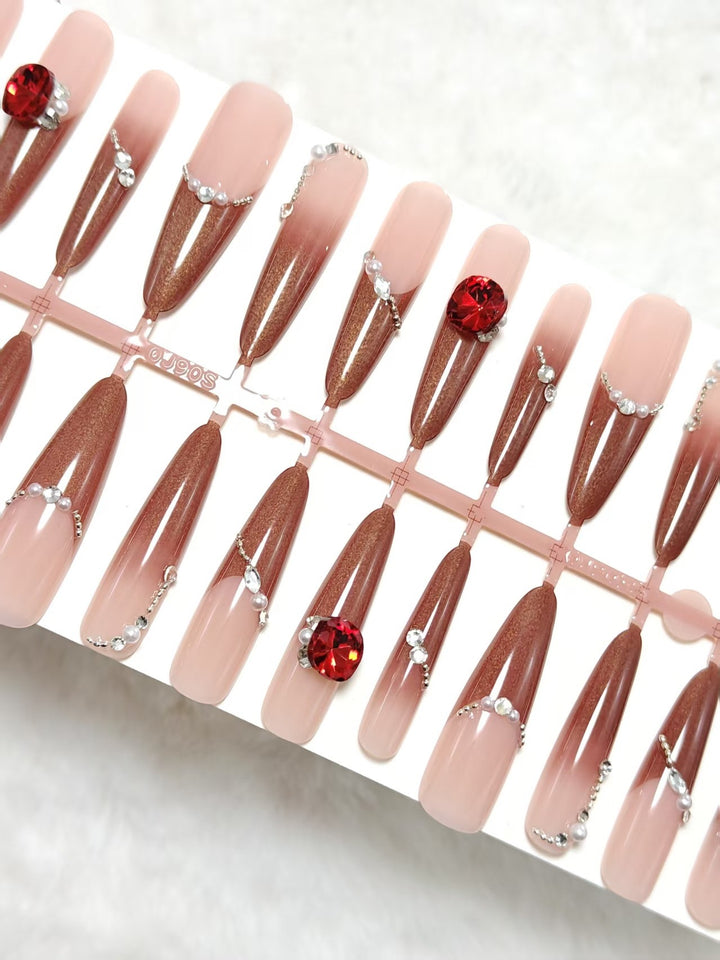 Artificial nails with luxurious 3D decorations and glamorous accents Stornfield
