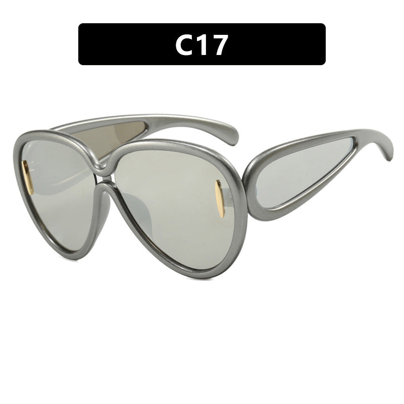 Women extravagant sunglasses in creative design Stornfield