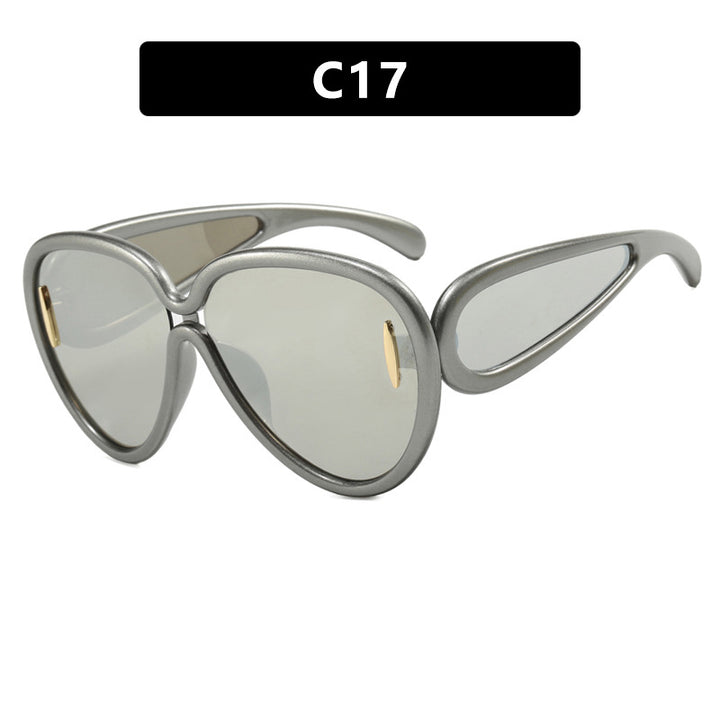 Women extravagant sunglasses in creative design Stornfield