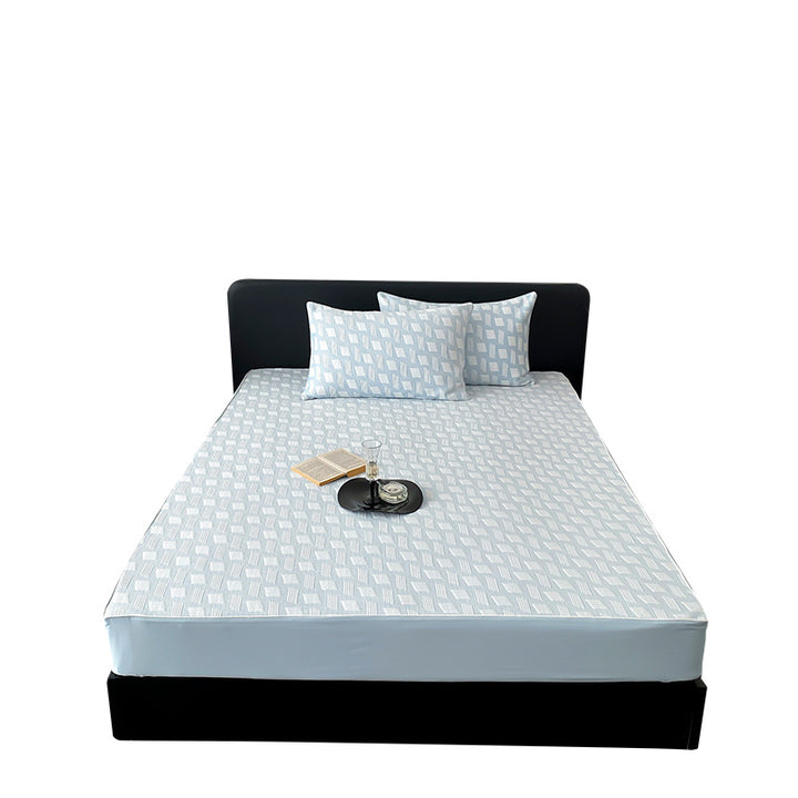 Quilted mattress protector with all-round elastic and floral relief structure