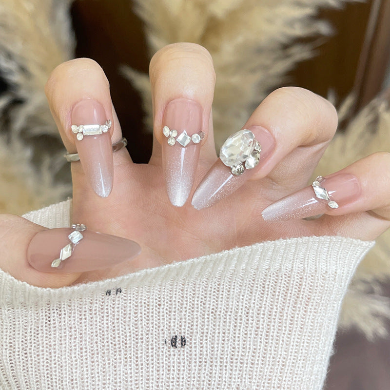 Artistic Nail Extensions with Decorative Elements Stornfield