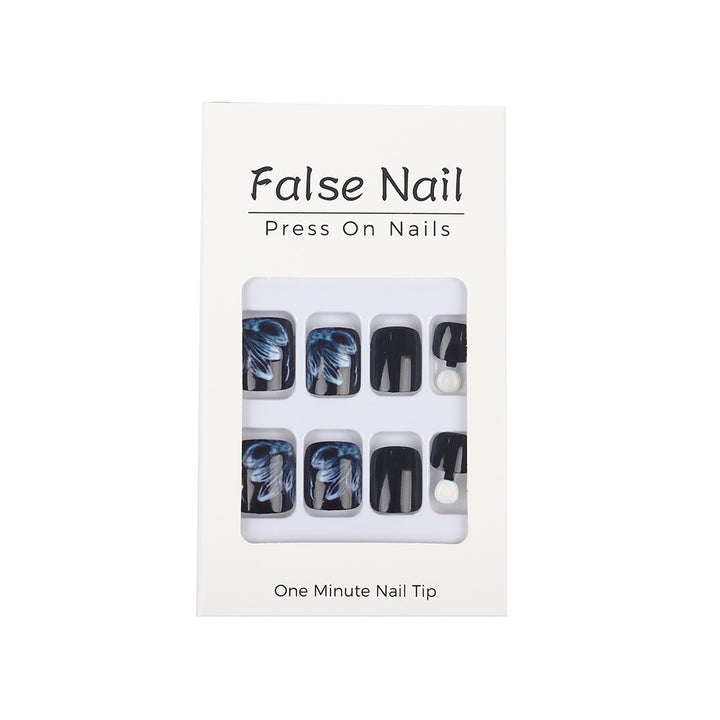 Glamorous artificial nails with floral accents Stornfield