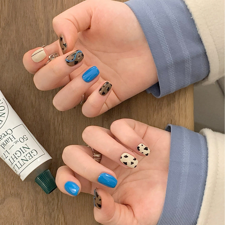 Creative Nail Art with Playful Patterns Stornfield