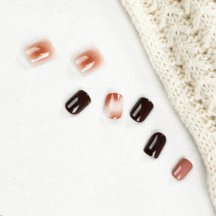 Elegant Nail Art with Glitter and Ombre Effect Stornfield