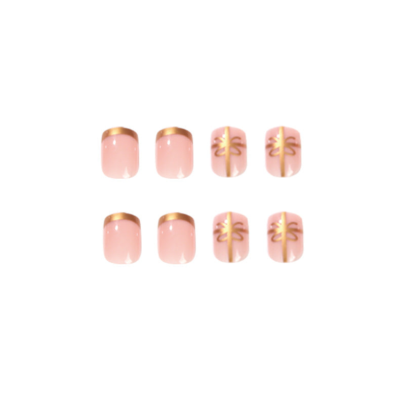 Elegant nail design with gold accents Stornfield