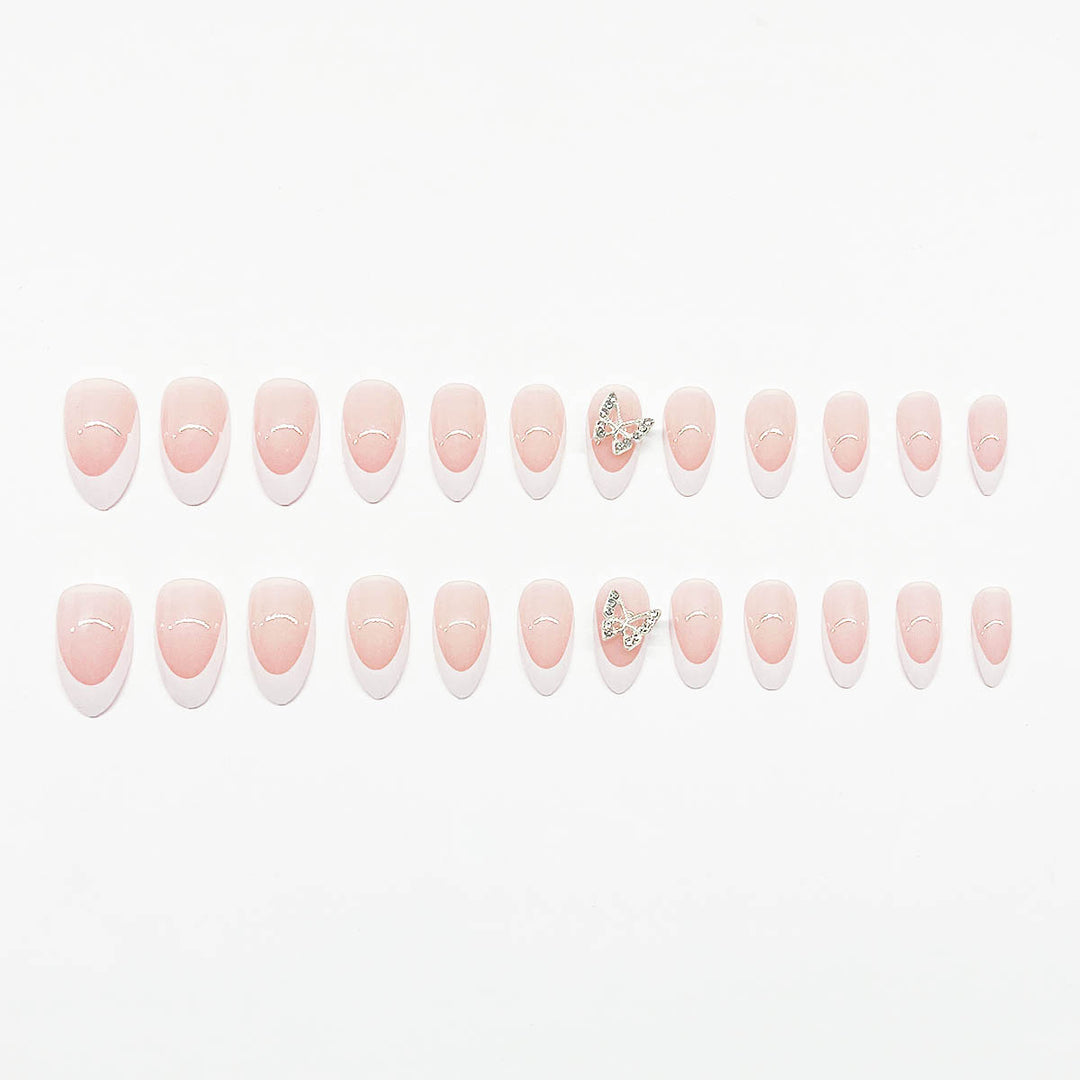 Artificial nail set with elegant French design and rhinestone-embellished accents Stornfield