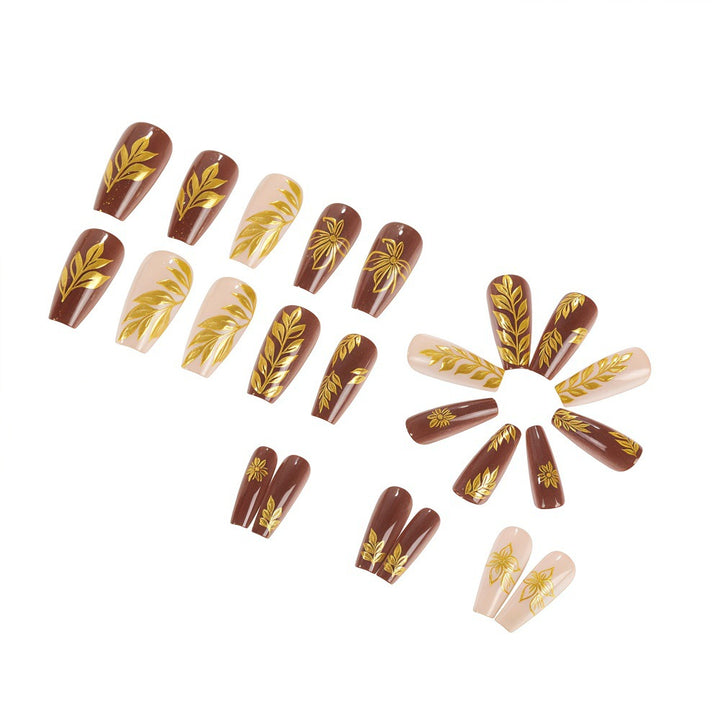 Artificial nails with floral gold design Stornfield