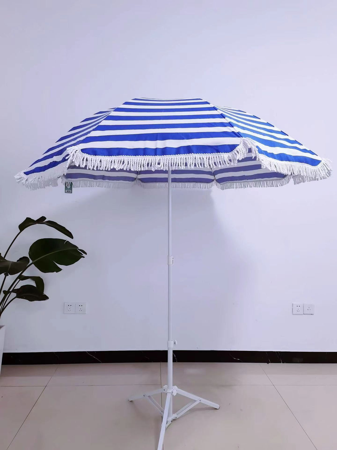 Women's sun umbrella with stylish tassels Stornfield