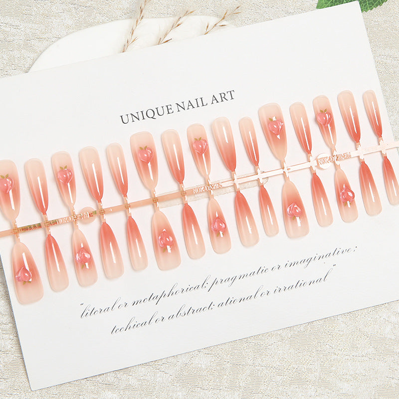 Nail set in elegant ombre design with artistic accents Stornfield