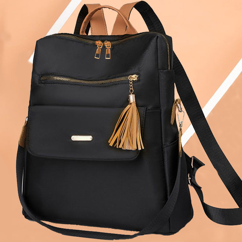 Multi-Functional Backpack with Decorative Tassel Stornfield