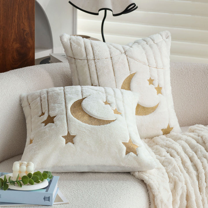 Cuddle pillow with star and moon motif