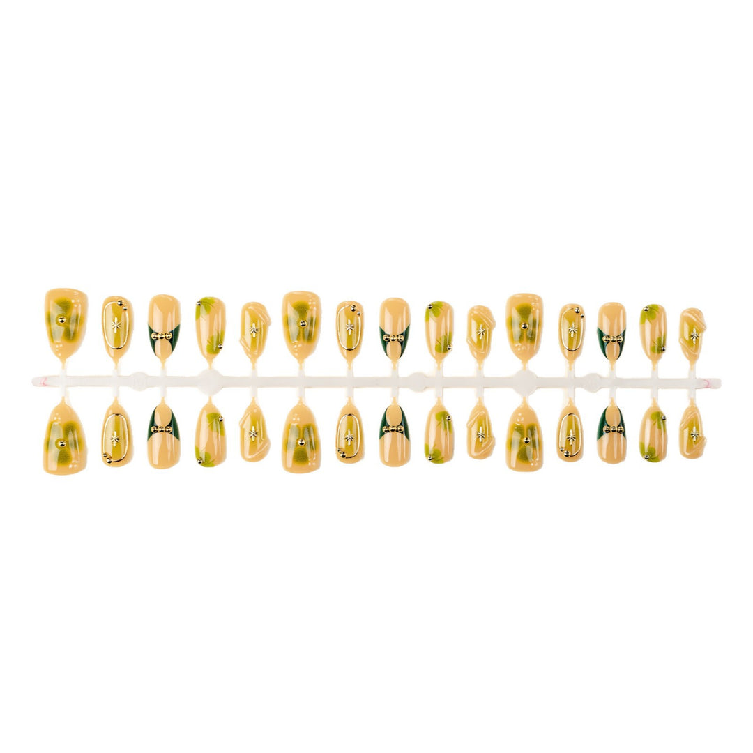 Artificial nail set with filigree floral accents Stornfield