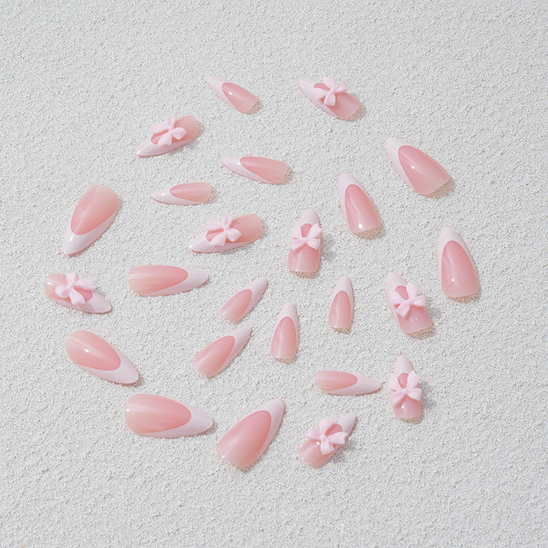 Nail art set with playful bow accents Stornfield