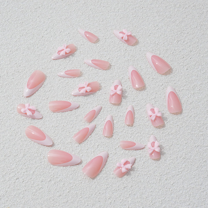Nail art set with playful bow accents Stornfield